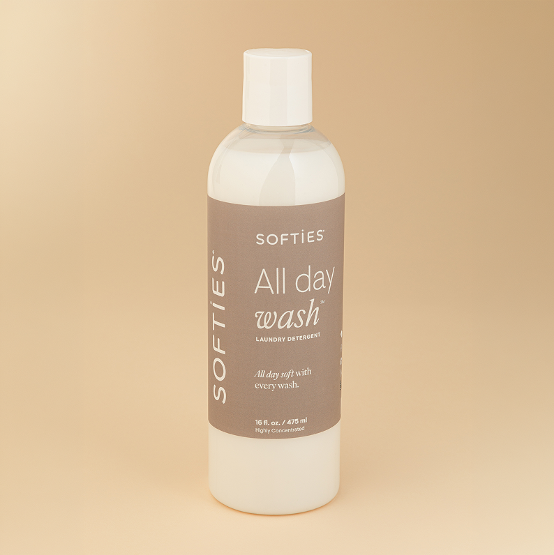 Softies x The Fill All Day Wash™ Laundry Detergent Bottle of Softies All Day Wash laundry detergent on a beige background